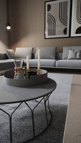 Close-up 3D render of a grey coffee table with mugs and candles, with a sofa in the background, by CG VIZ Studio.