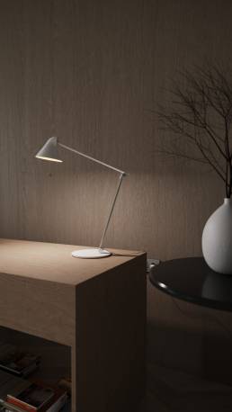 3D render of a study table featuring a lit table lamp and a white vase by CG VIZ Studio.